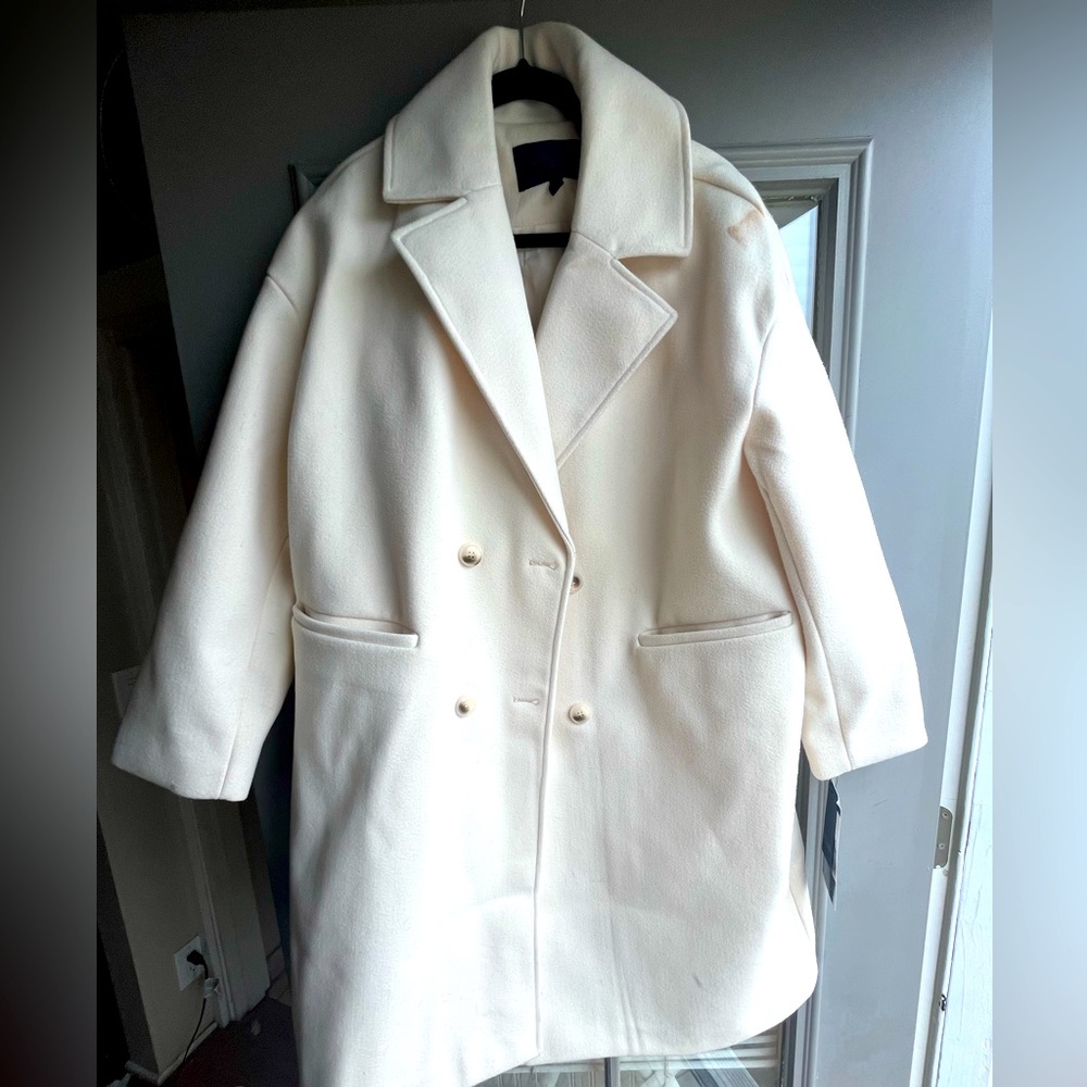 Cream colored long coat